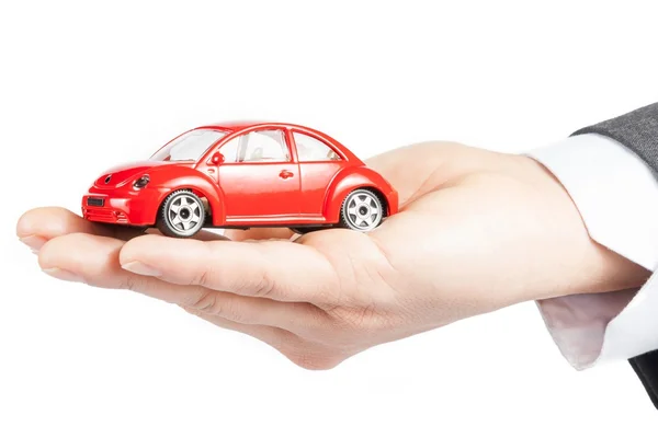 Автомобиль игрушки в руке человек концепции бизнеса страхование, покупка, Аренда, топливо или сервис и ремонт — стоковое фото