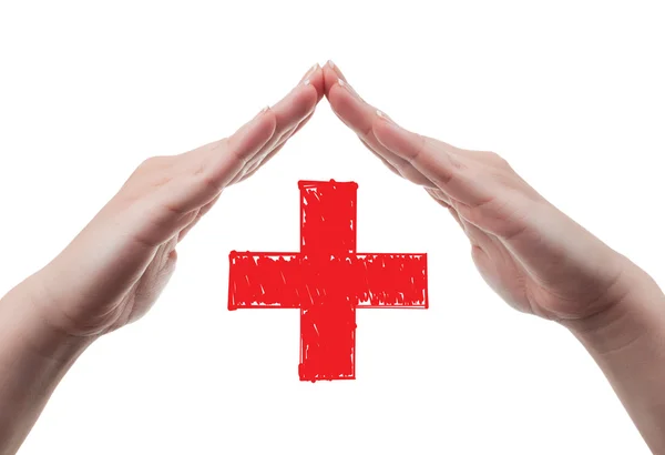 Руки, защищая концепцию Красного Креста — стоковое фото