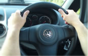 Holding the steering wheel 10:10